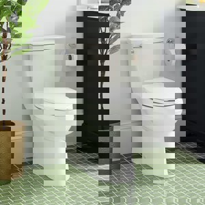 1.28 gpf Elongated One Piece Skirted Toilet in White